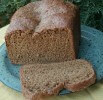 Caption: Norwegian Rye Bread, just minutes out of the bread machine. I added sesame seeds because my family likes them in bread. Dark, dense bread.