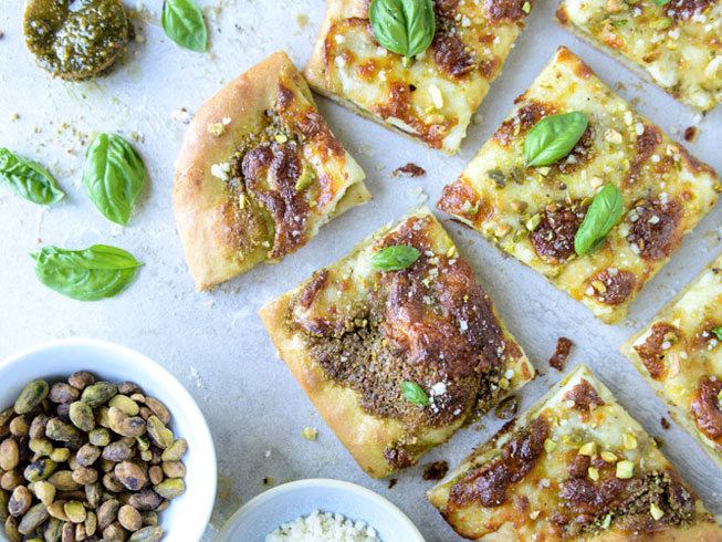Pistachio Pesto Pizza with Fresh Mozzarella and Honey.