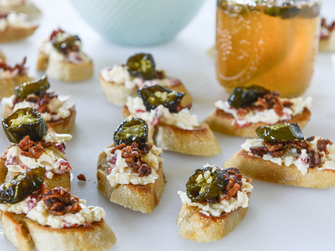 Bacon Ciabatta Crostini with Pimento Cheese and Candied Jalapenos .