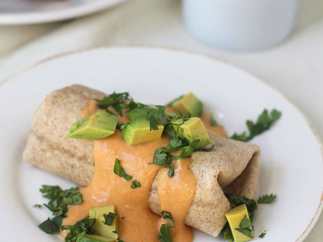 Chorizo and Egg Breakfast Burritos with Pumpkin Goat Cheese Cream Sauce