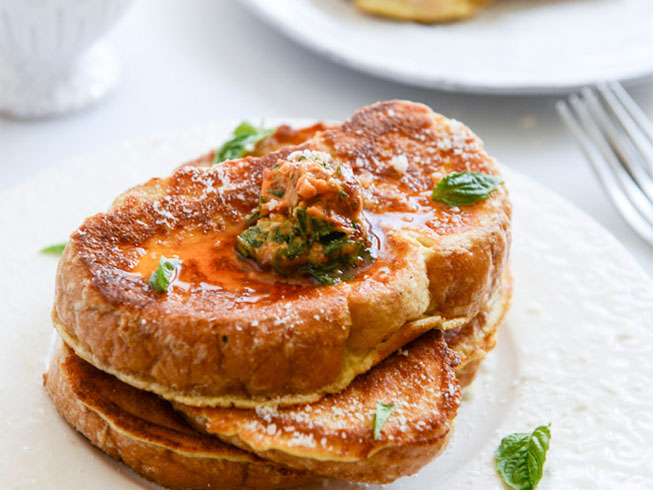 Savory Romano Crusted French Toast with Cherry Tomato Basil Butter.